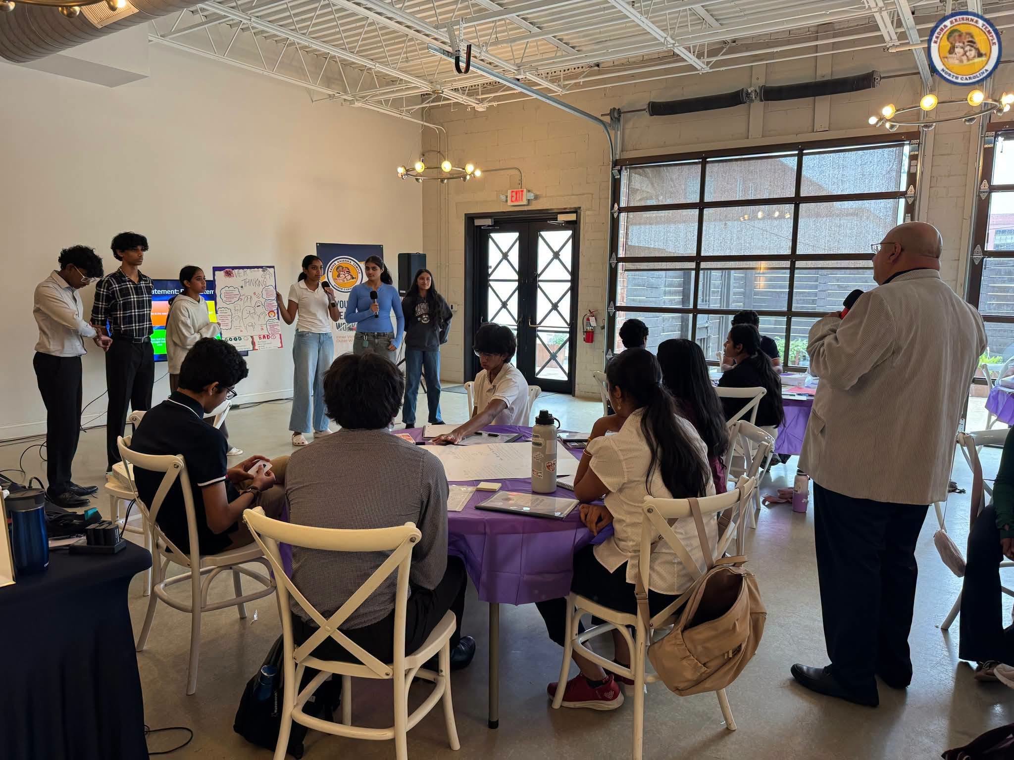 A student group presenting their project to the audience
