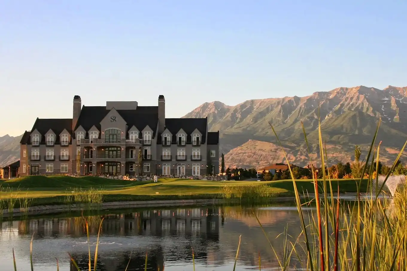 The Sleepy Ridge Golf Course sitting in front of a beautiful pond.