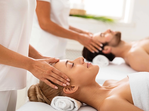 A couple receiving a massage.