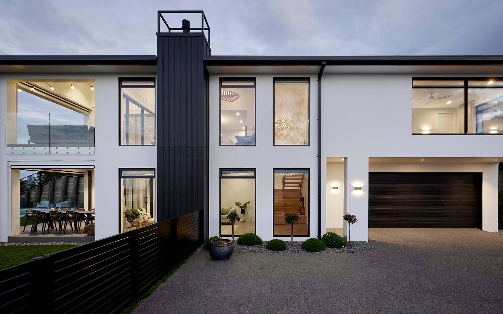 Two storey house design, black journey inspiration, white cladding, outdoor decking inspiration