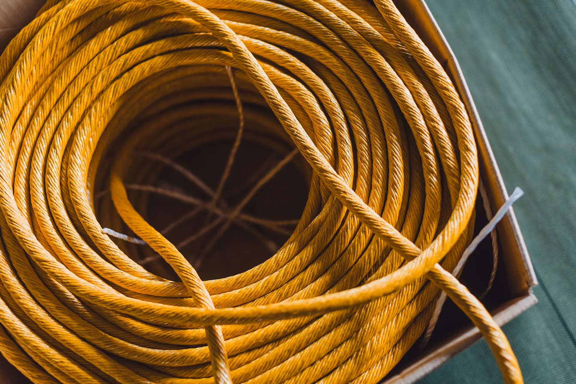 Coiled synthetic straw rope used to construct the Shimenawa rope for Strawfire's private dining room