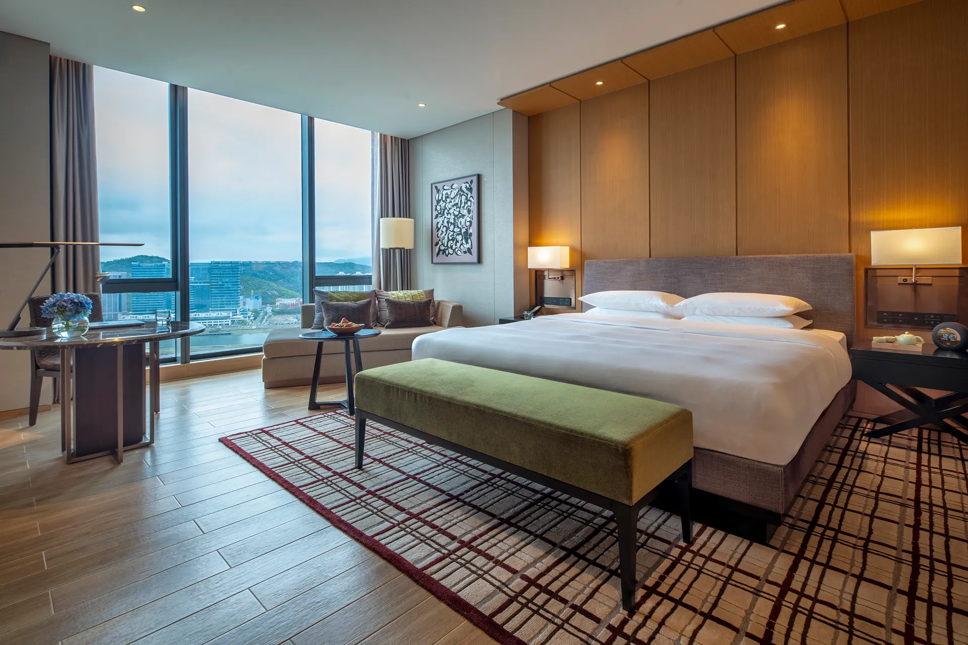 Executive suite bedroom at Hyatt Regency Hengqin with panoramic city views