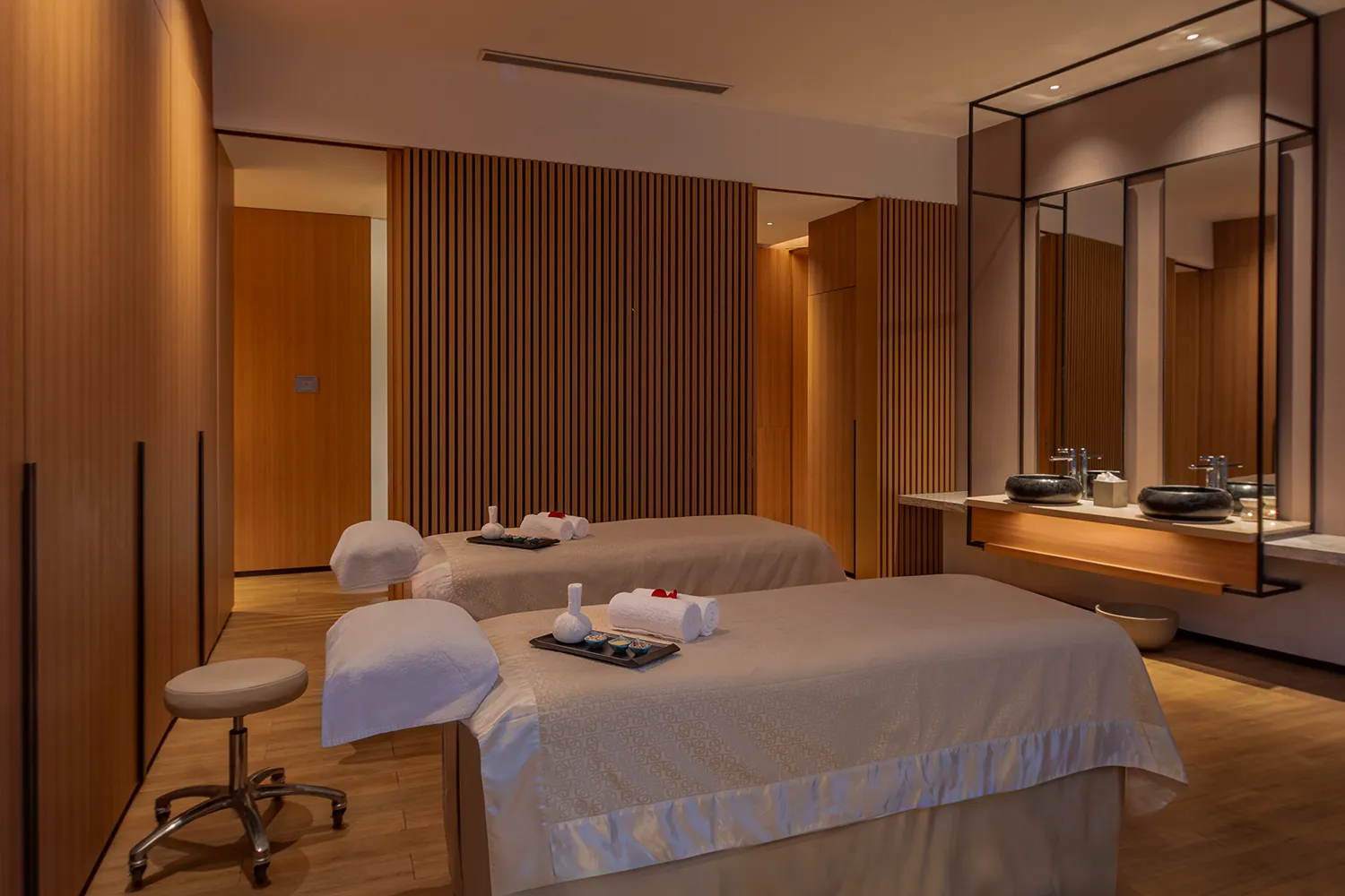 Spa treatment room at Hyatt Regency Hengqin with paired treatment beds