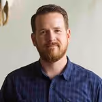 Mirror selfie of man with cat perched on shoulder Glen Ridgeline Insights Amazon agency million dollar seller review