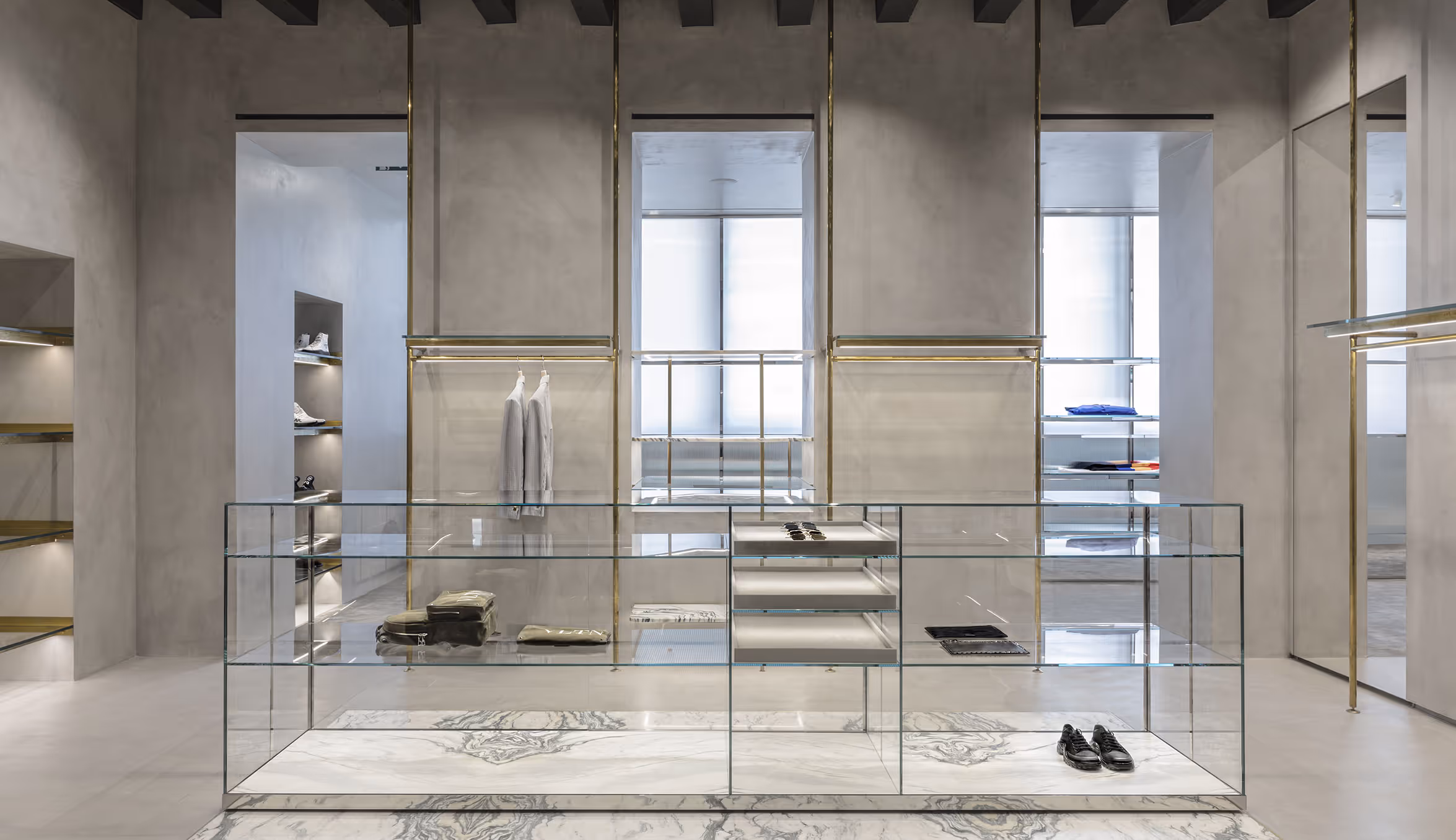 Showroom moda design minimalista vetro cemento