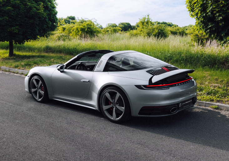 Image of a parked gray Porsche.