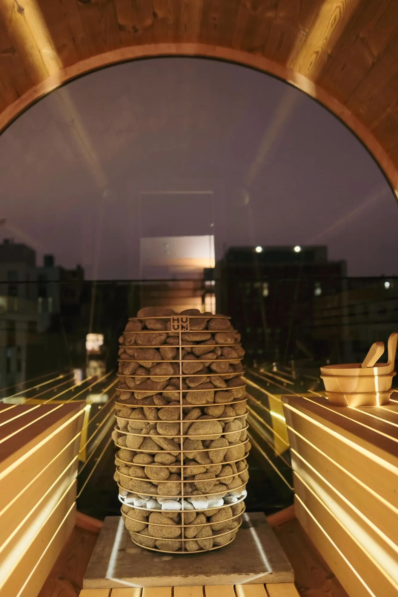 How do I install the Design LED lighting under the sauna benches with a wood-fired sauna heater?