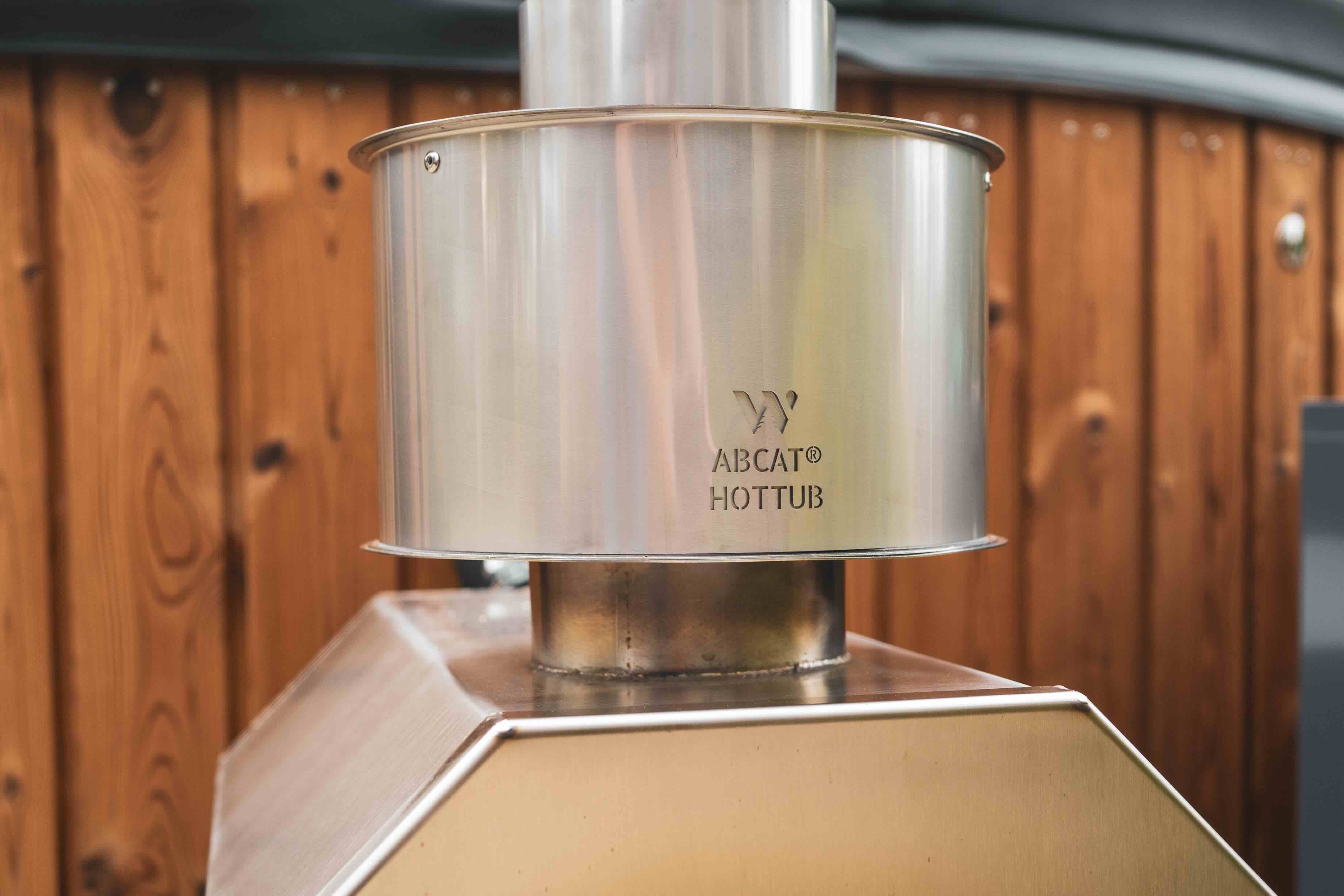 Kan ik de geur en rook van mijn hottub houtkachel verminderen?