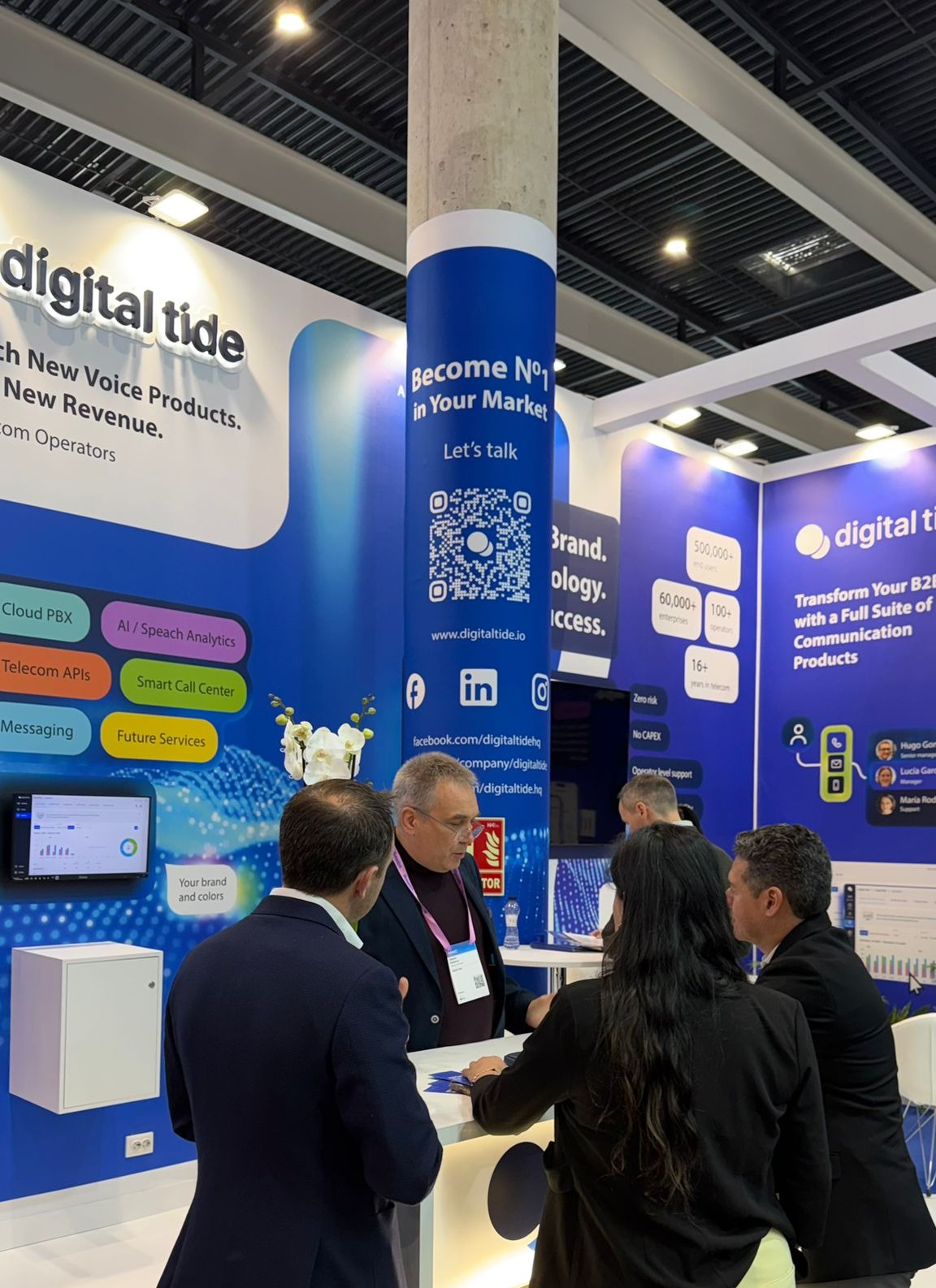 Dgital Tide  Anna Gonzales and Aleksei speaking with clients