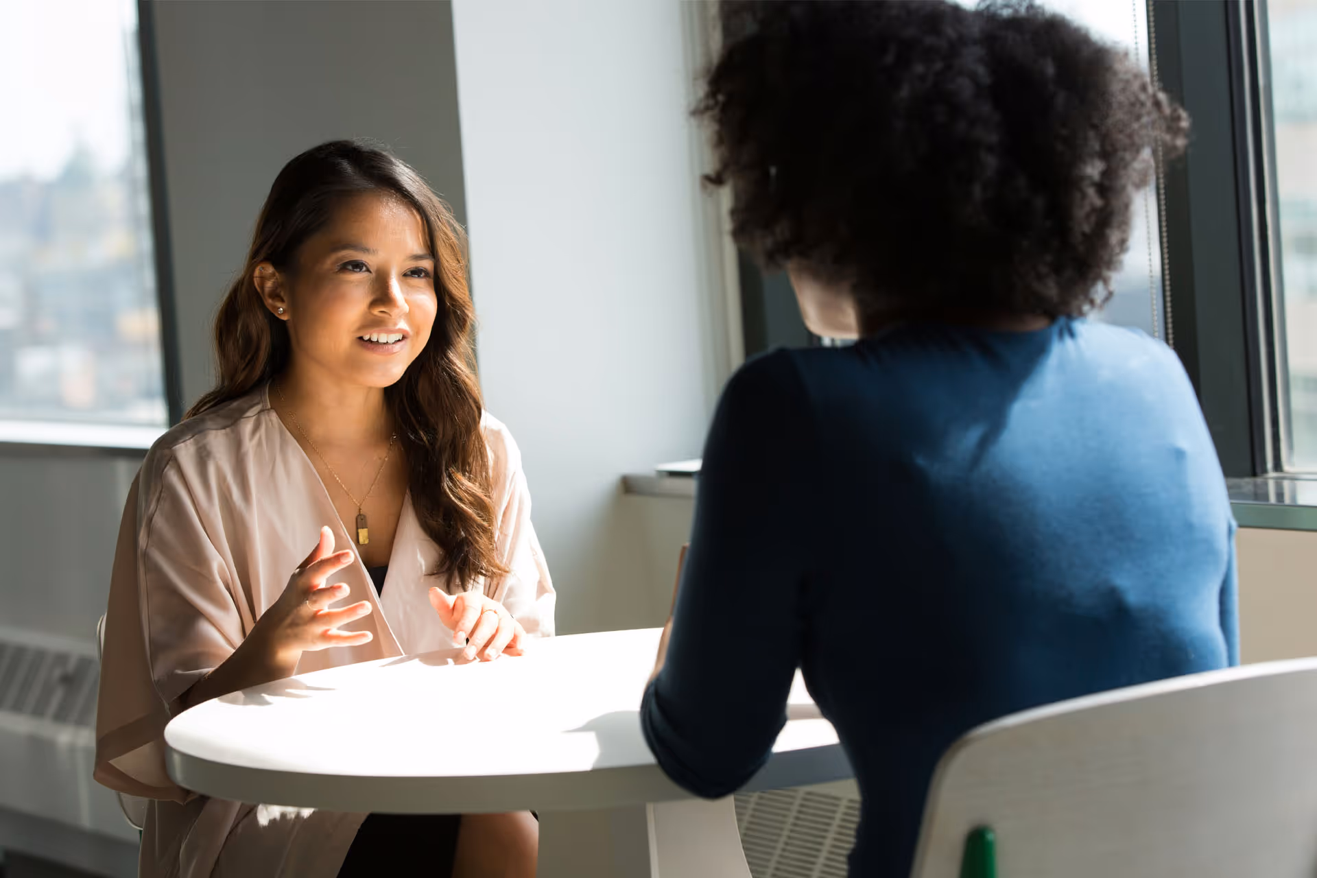 Female work collegues in discussion