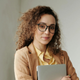 A woman in office smiling