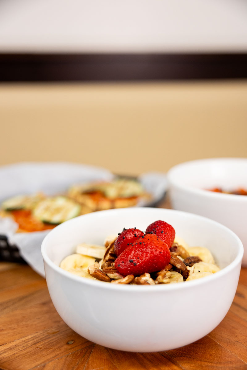 Oatmeal bowl on wooden table.