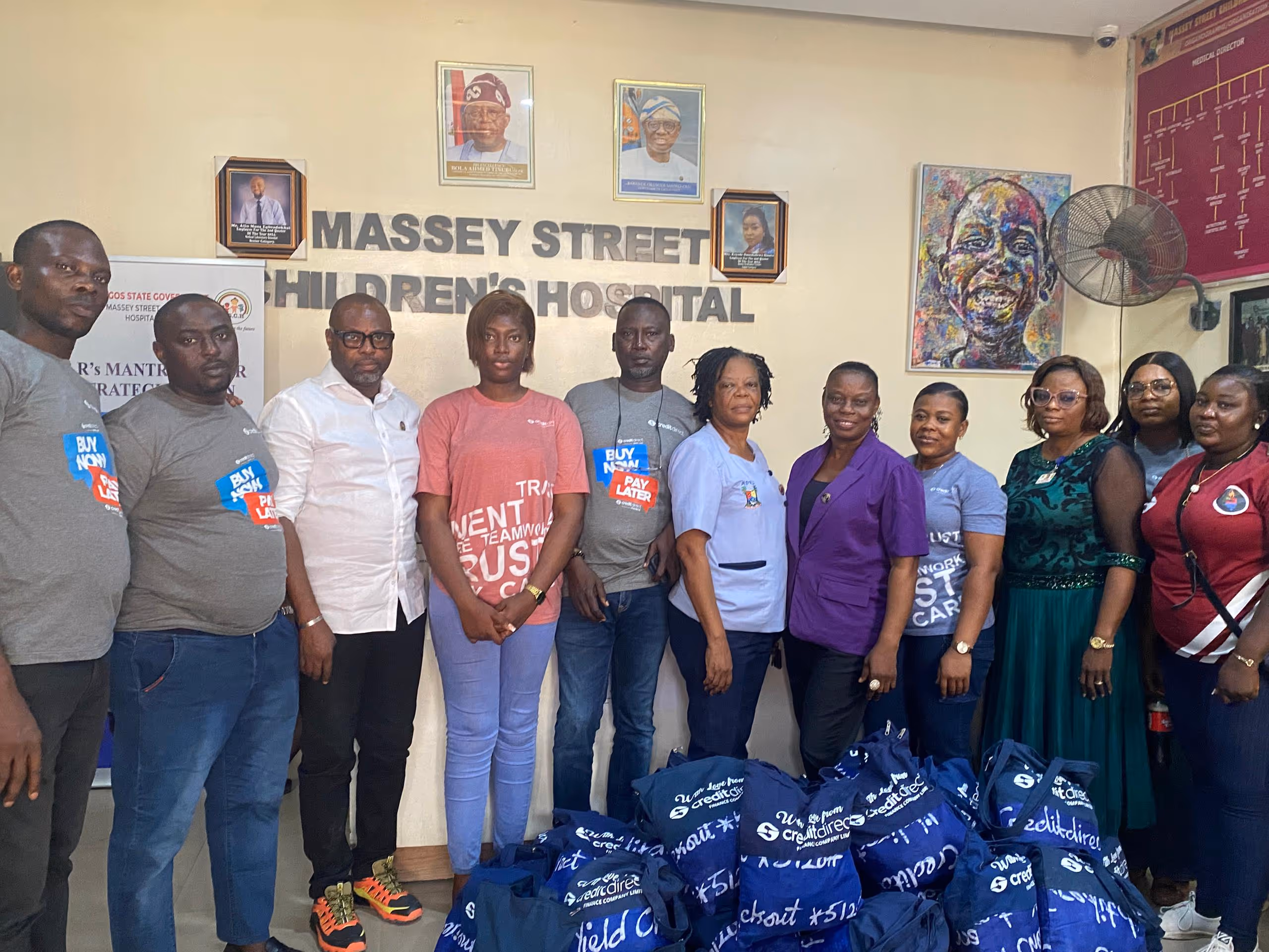 Credit Direct team with Mrs. Esther Afolabi-Orukotan (Head of Nurses) and Mr. Raji Ololade (Head of Hospital Administration)