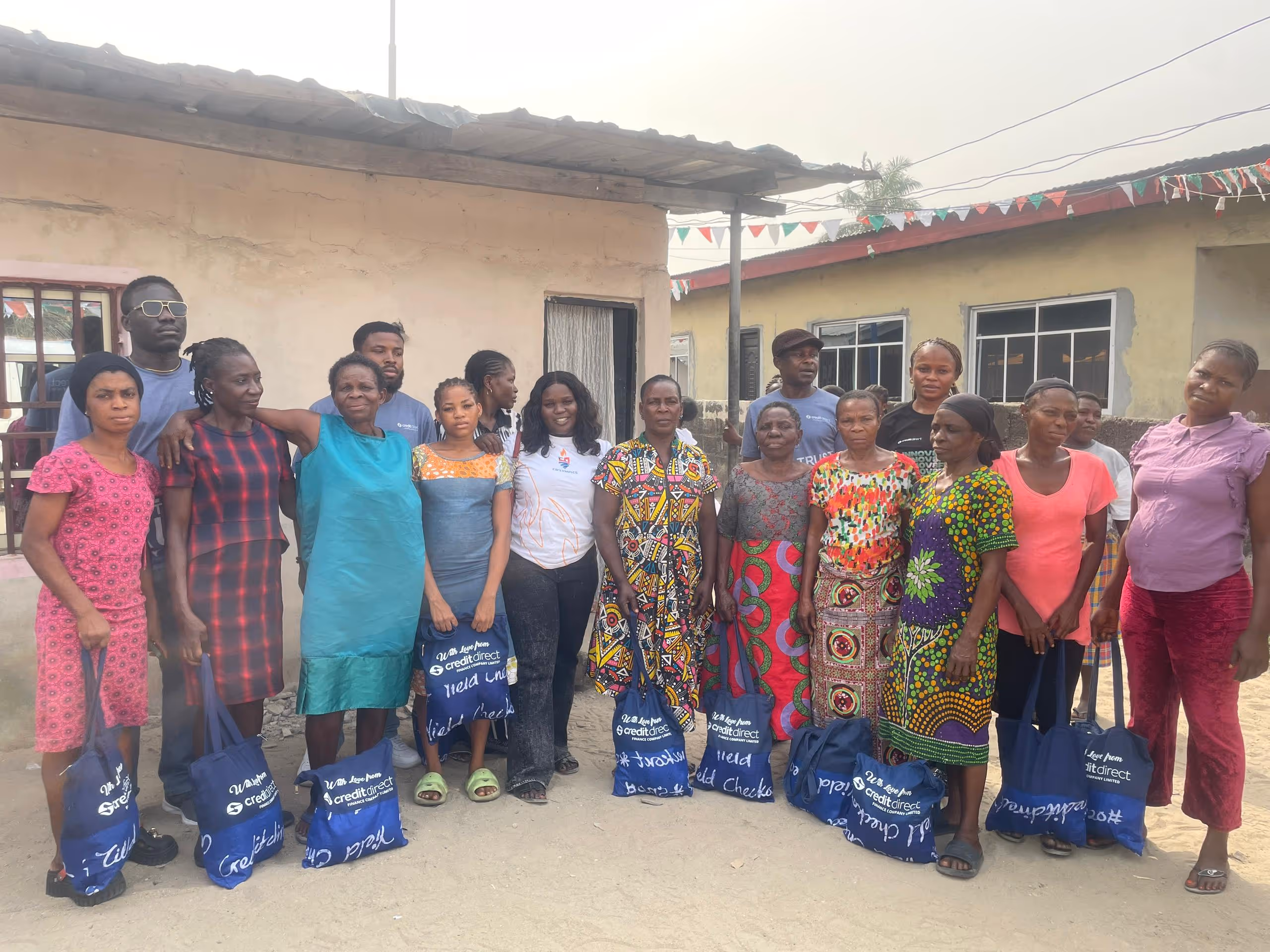Credit Direct team with Mrs. Nawli Danagogo, Permanent Secretary of the Office of Welfare and Social Development