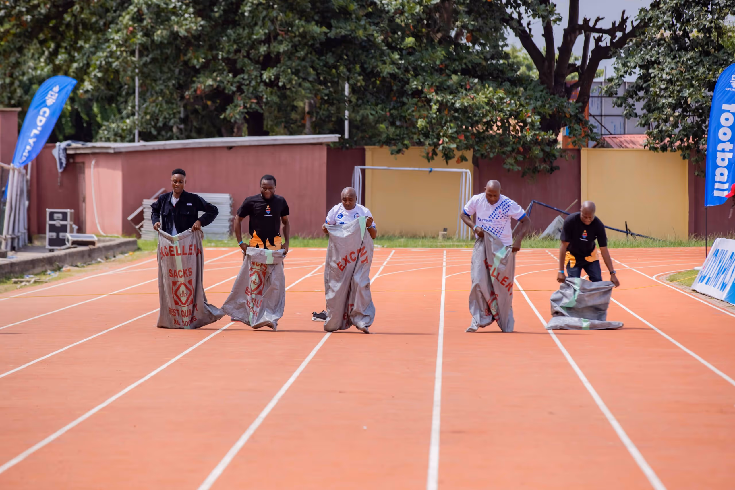Sack race with staff members