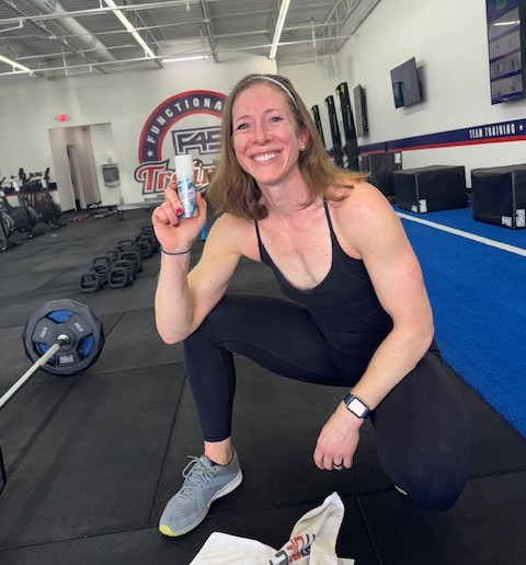 woman holding product sample