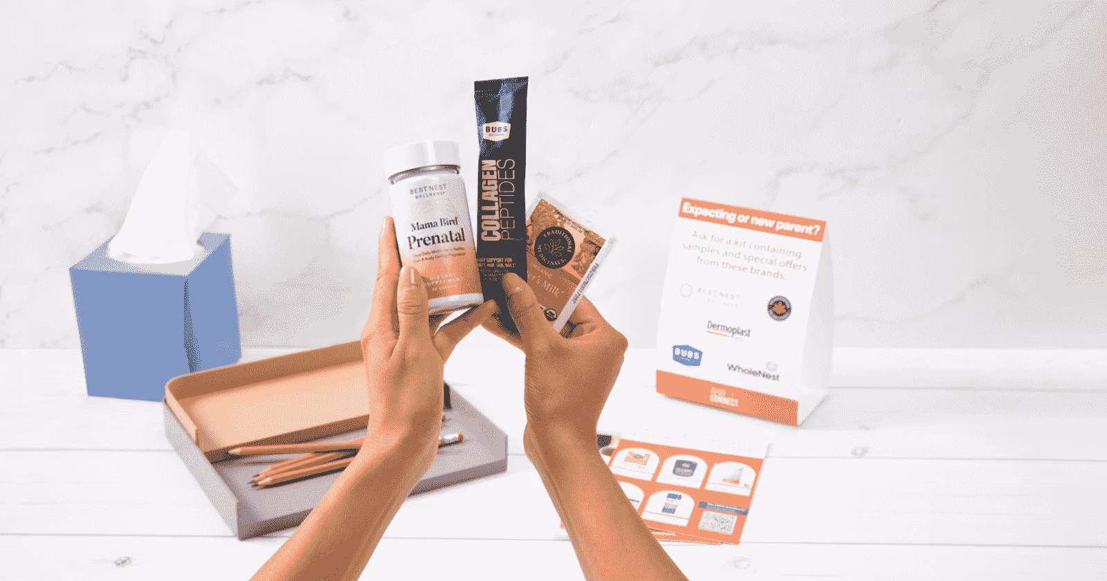 hands holding sample products