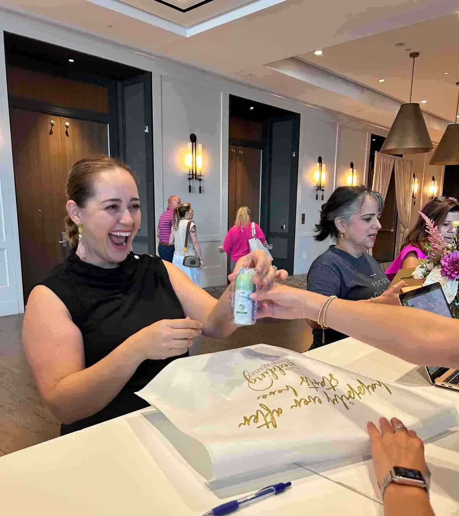 woman receiving dove+degree sample