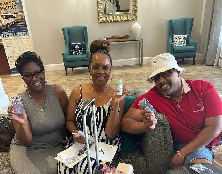 three travelers holding dove+degree samples