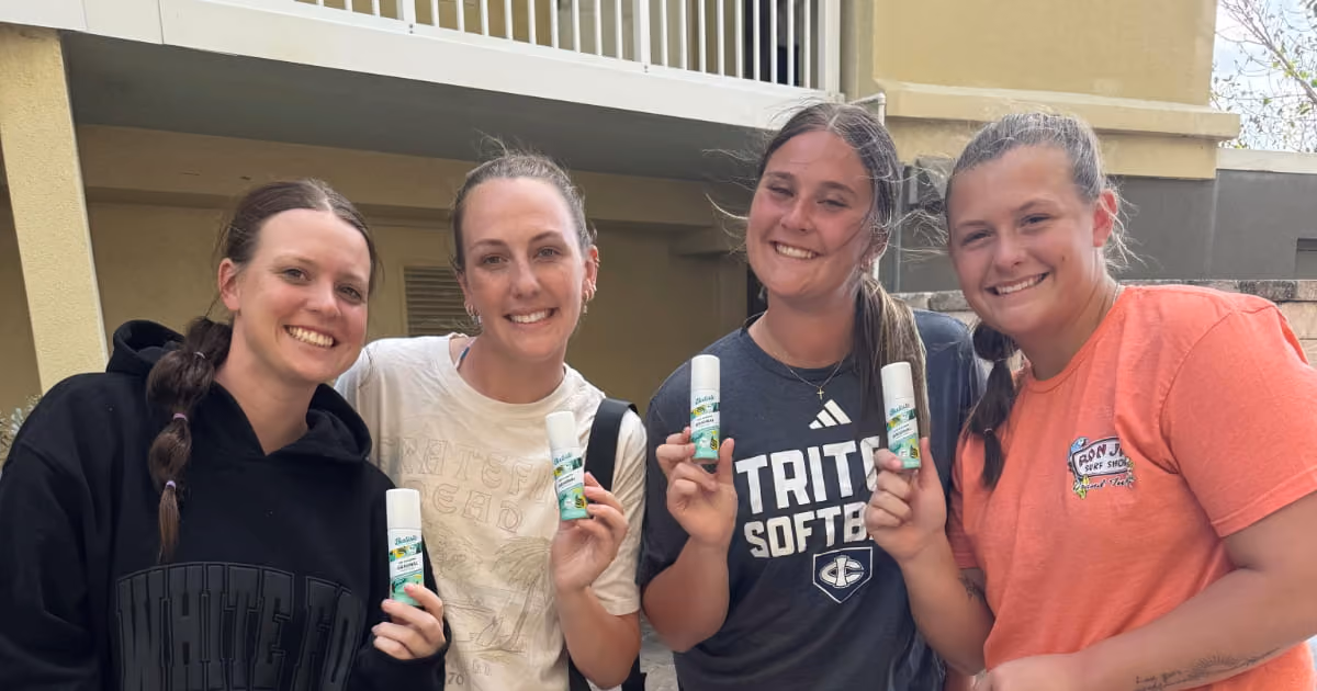 softball girl-team holding batiste samples