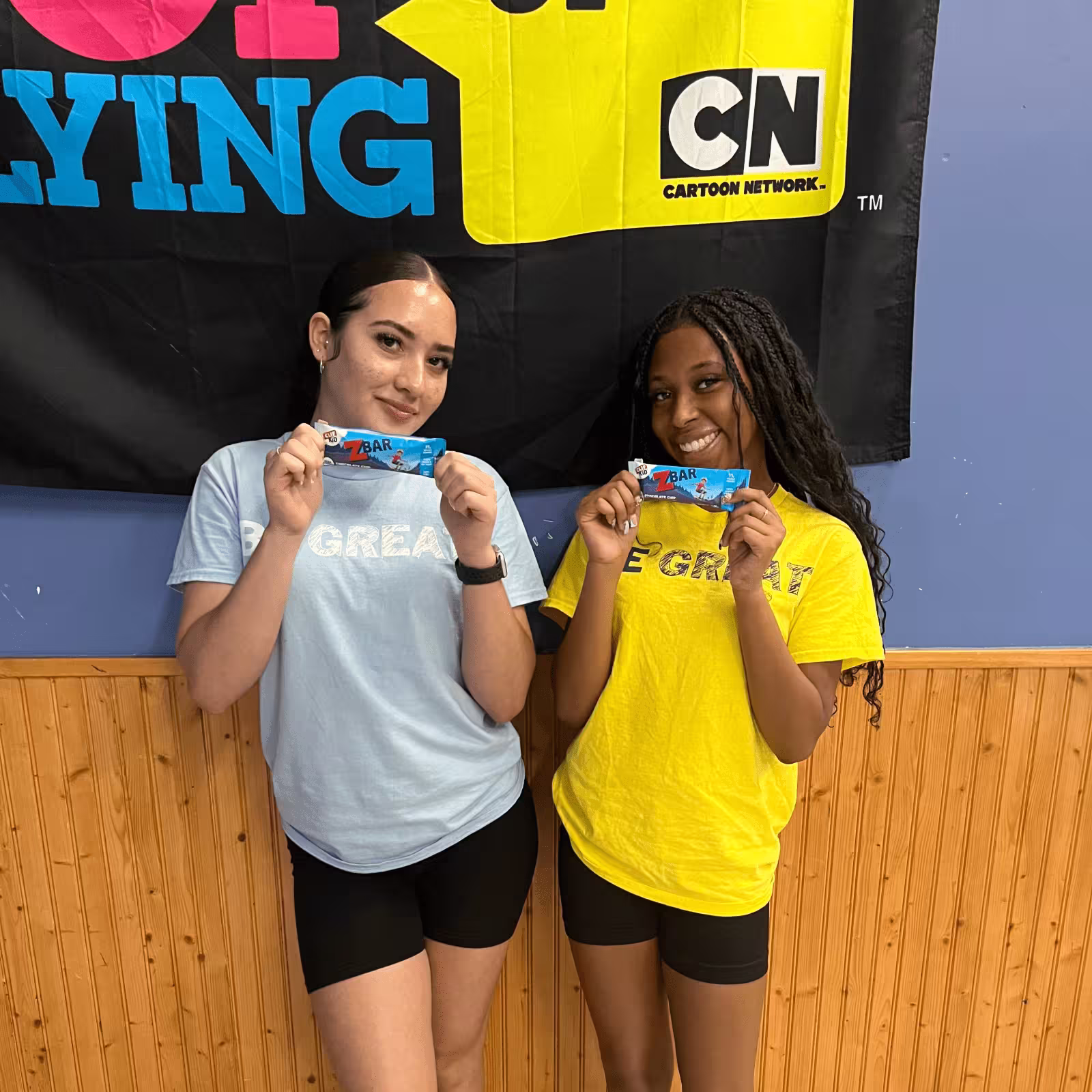 two women holding CLIF Zbar samples