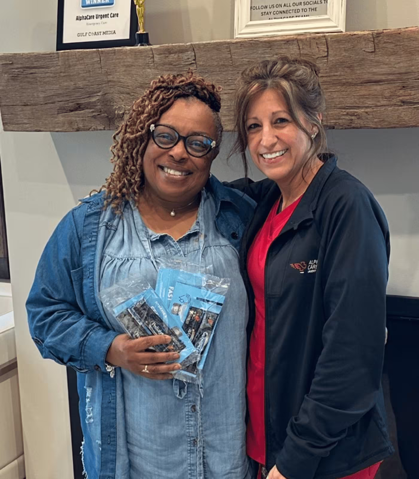 two women posing with pedialyte samples