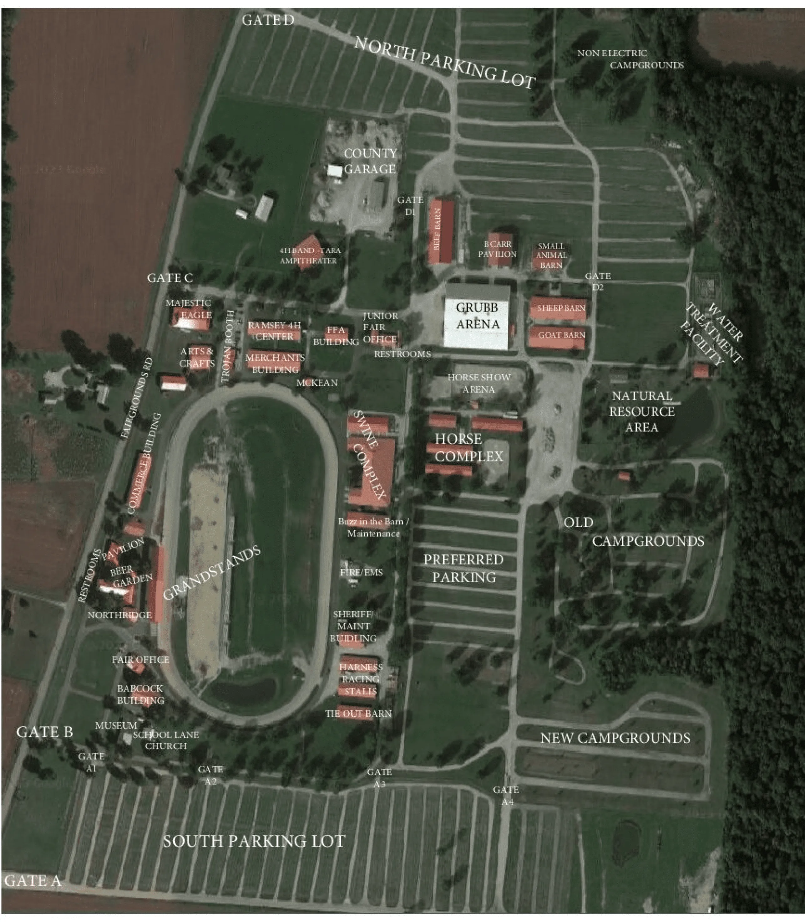 An aerial view of an area with a parking lot.