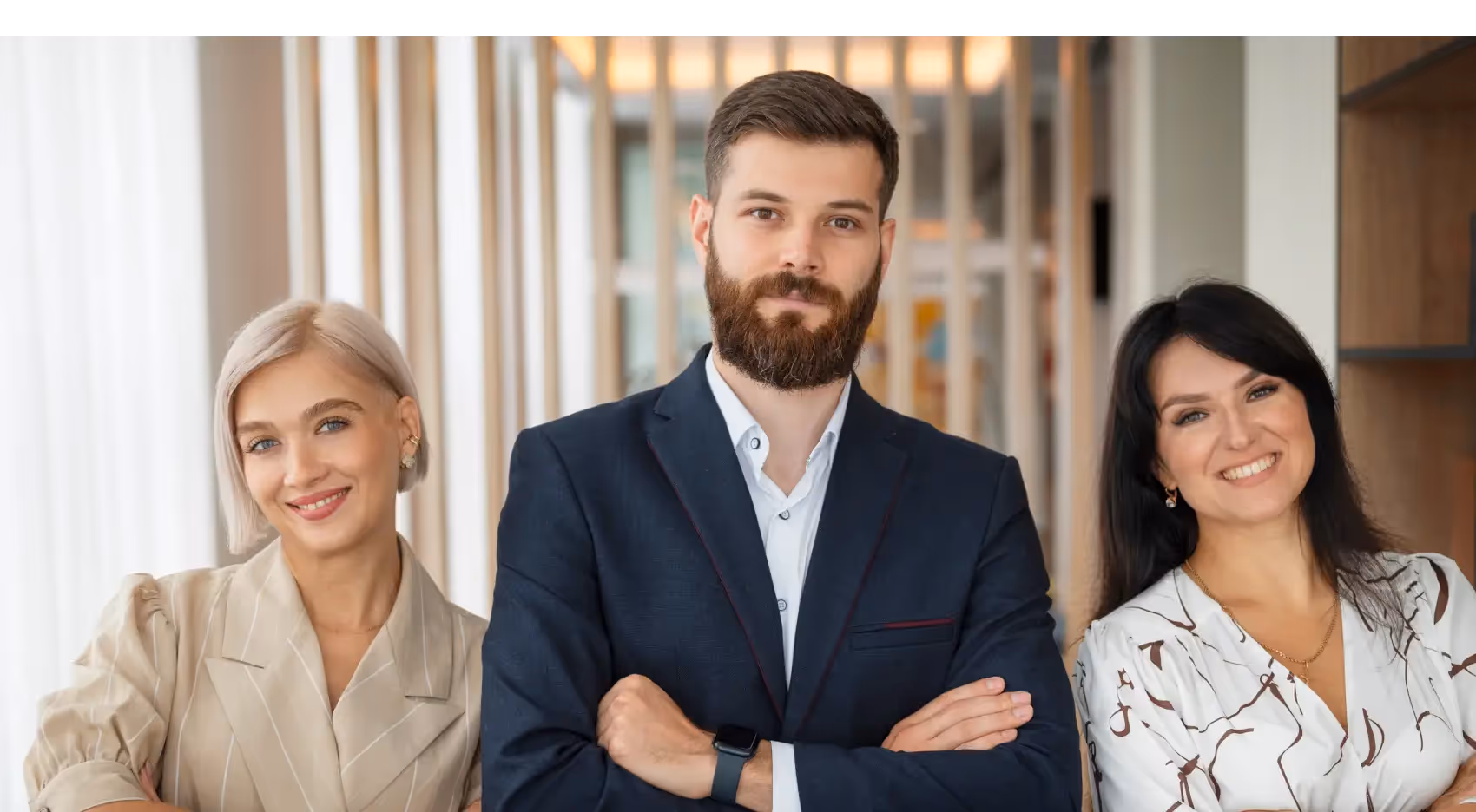 Three people looking at the camera