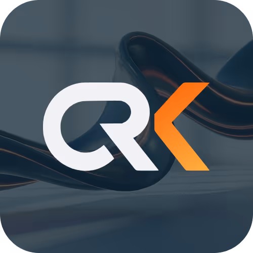 Stylized letters CRK with white C and R merged and an orange K on a blurred dark background.