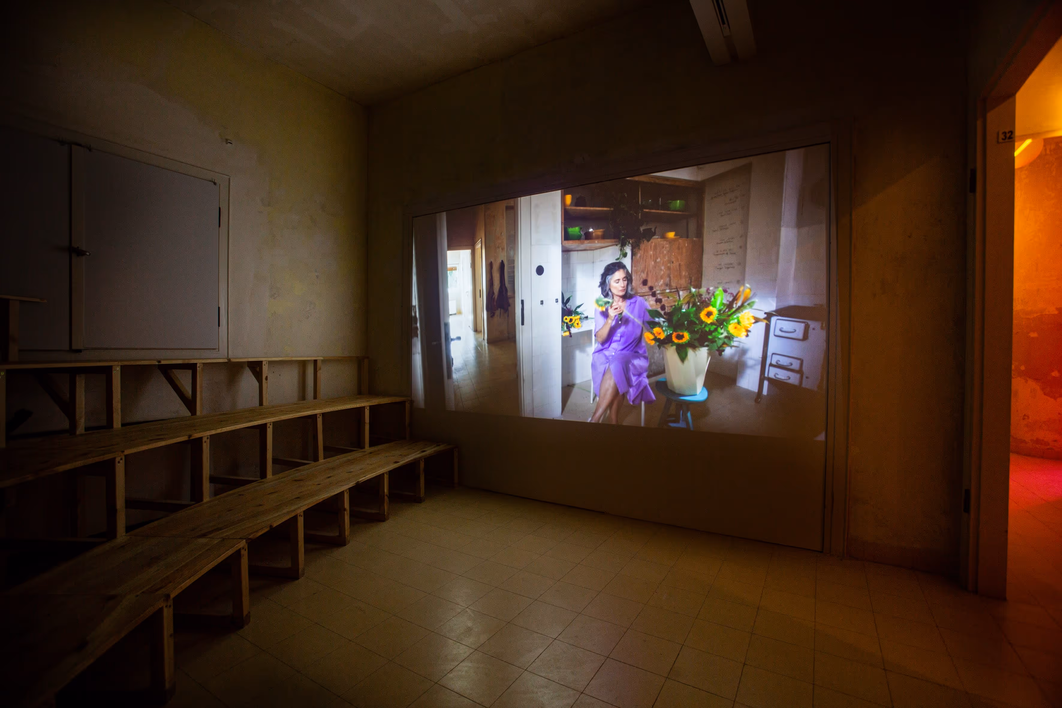 interior, being time itself, exhibition by tal alperstein, immersive projection with stepped seating inviting shared attention and slow viewing