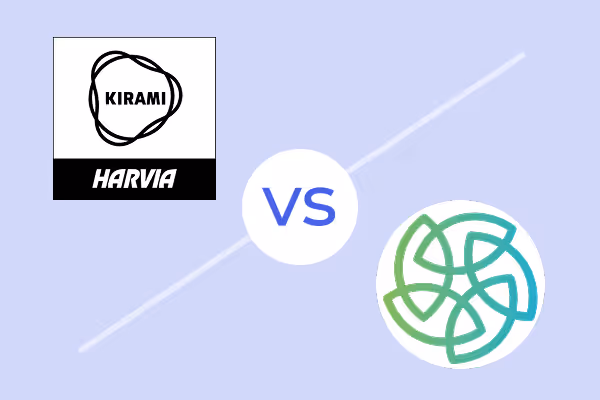 Man pushing a large black wrapped pallet onto the back of a blue delivery truck using a metal ramp.