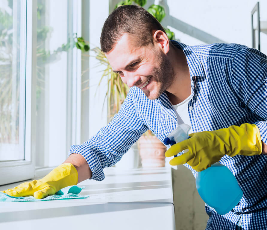 Man Cleaning His Home