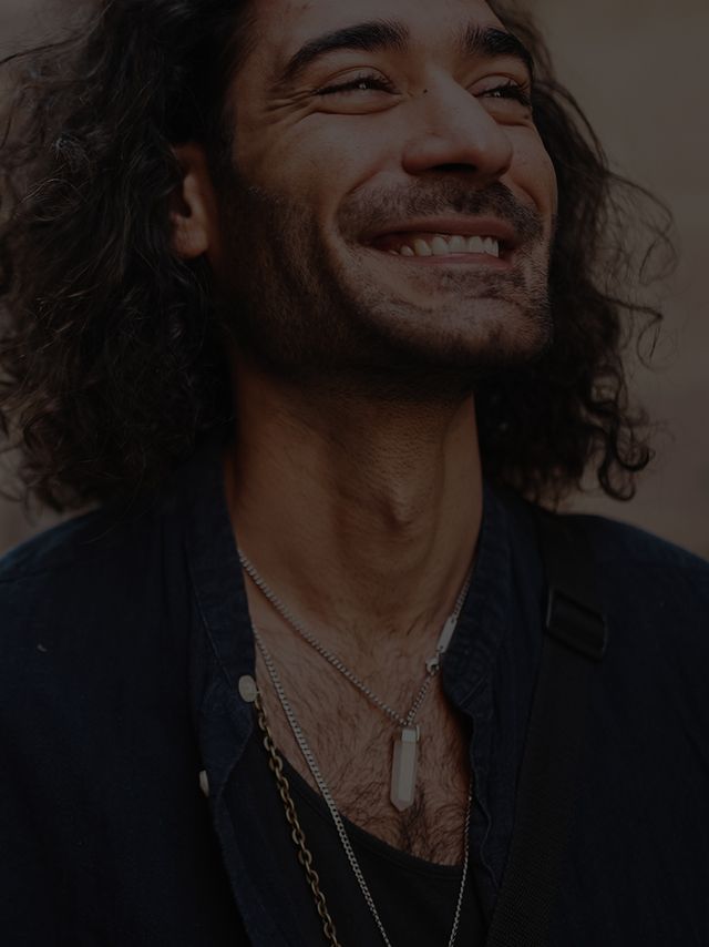 Man smiling with easy confidence