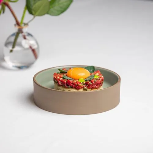 Ein Teller mit leckerem Essen von Bai Lu Noodles