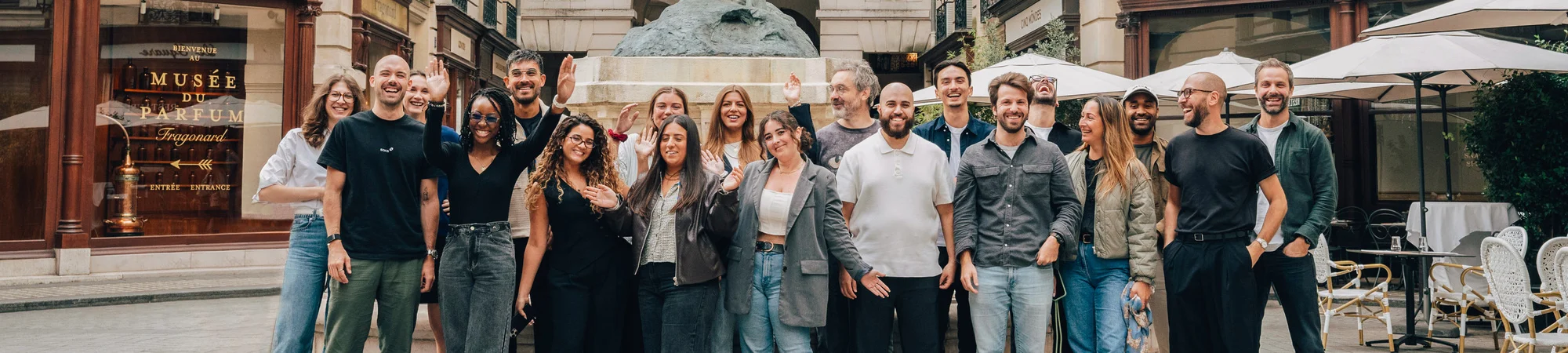 a group photo of Sora's team