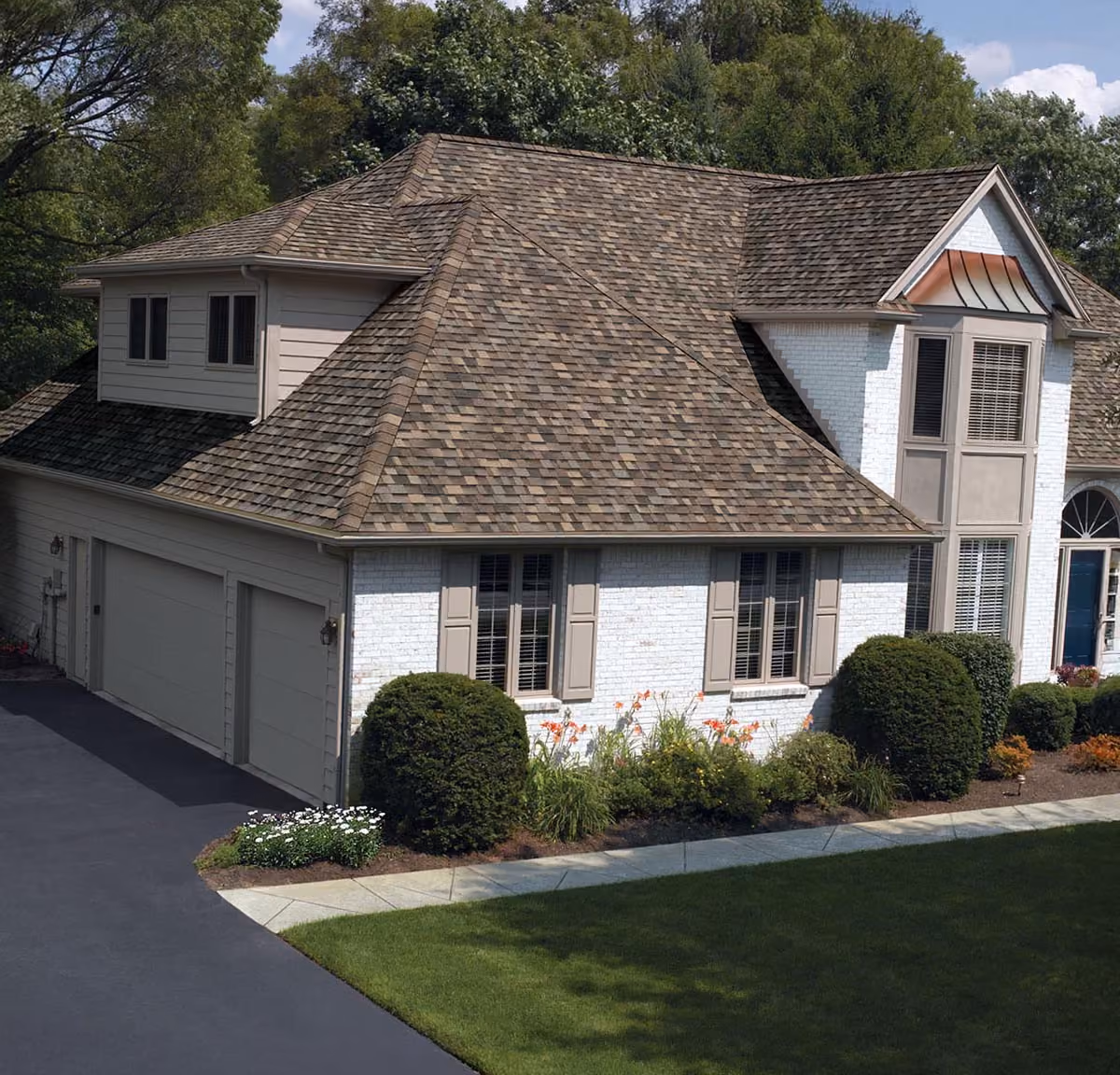Suburban home with upgraded asphalt shingle roof
