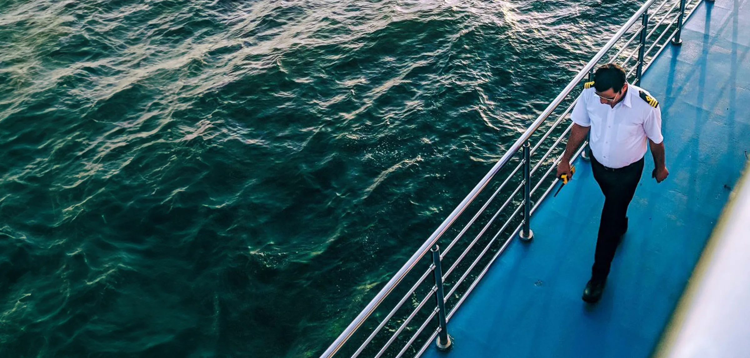 A captain walking on the ship