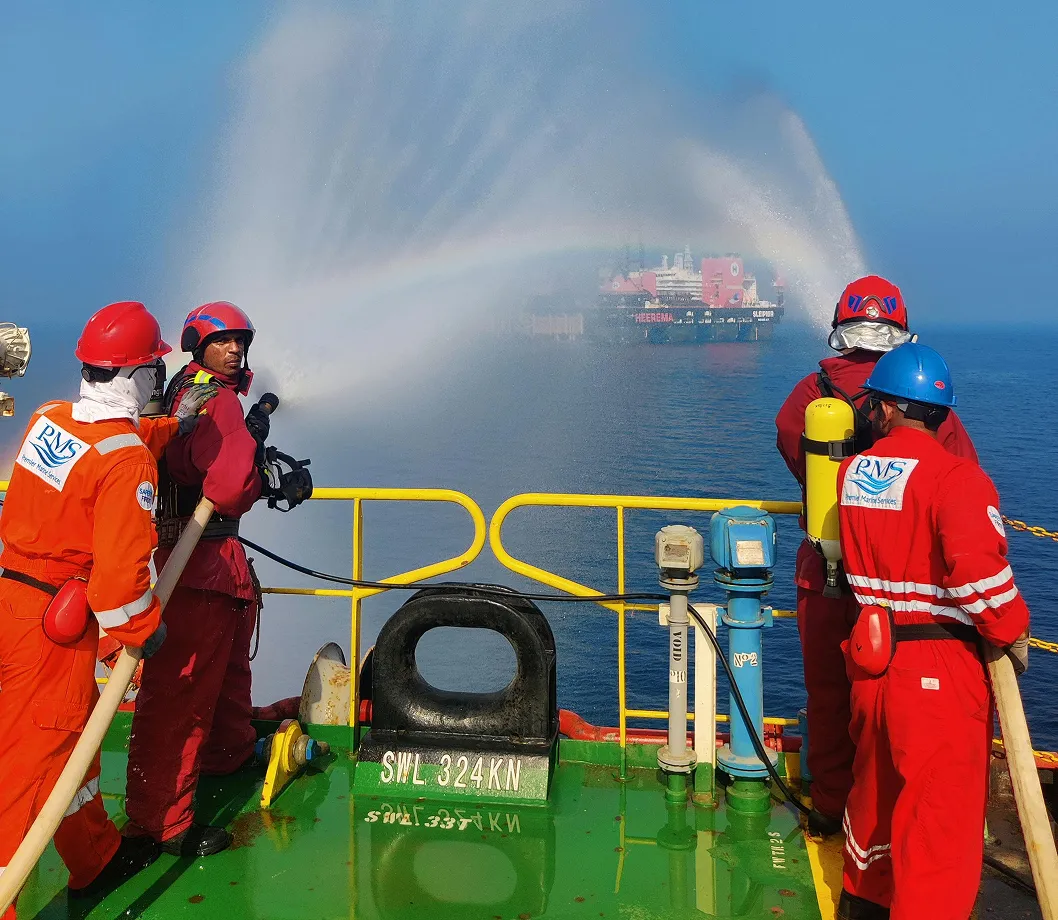 Firefighters spraying water