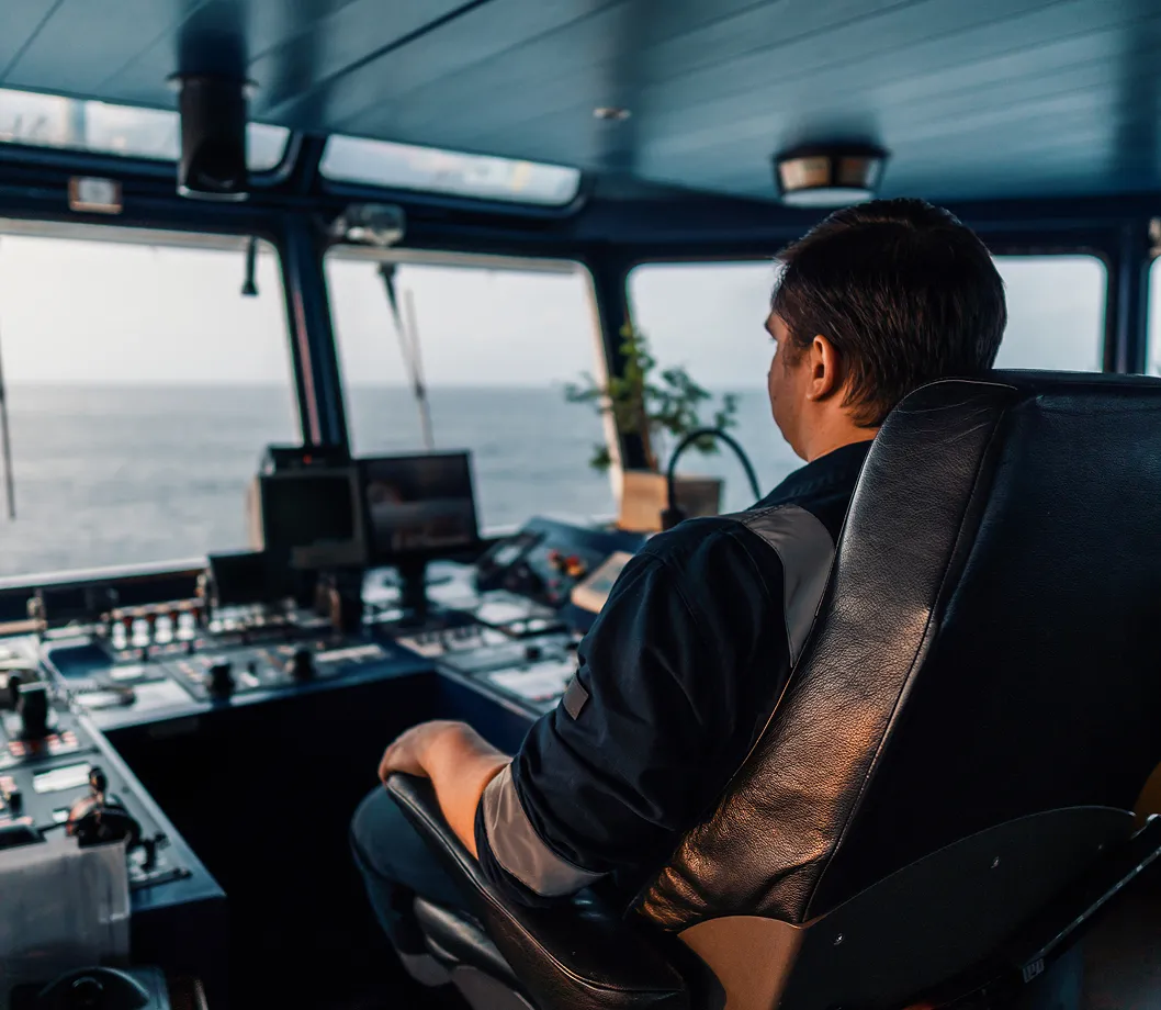 A man in a ship control room