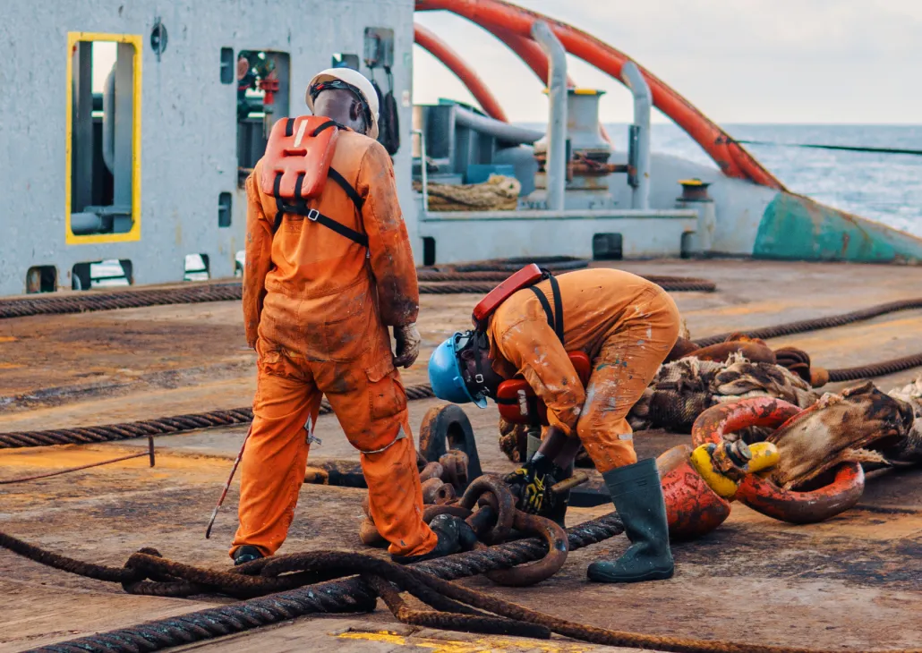 People in orange safety gear