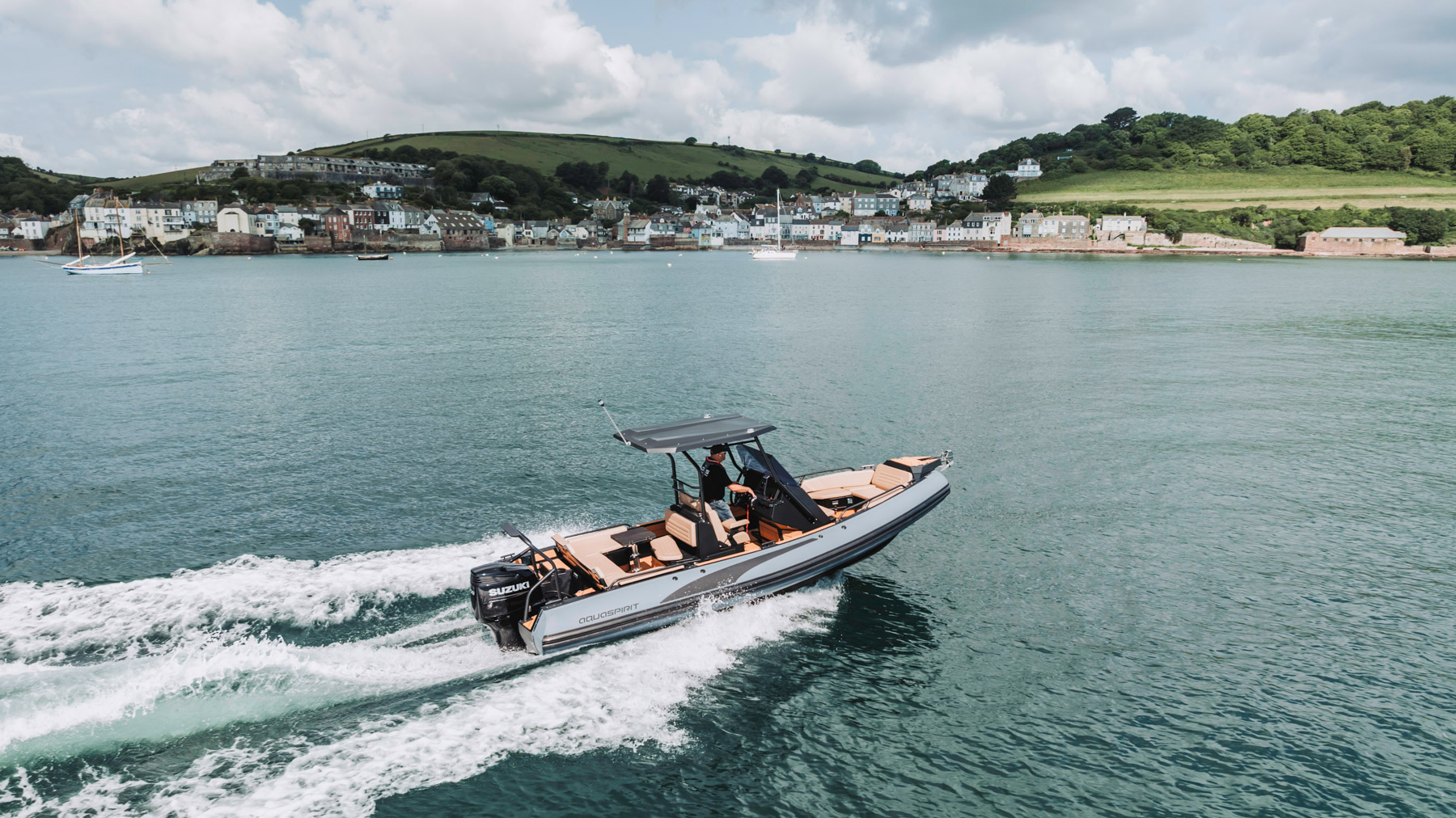 Premium 7 meter RIB boat is racing across the ocean. trough the water, California coast