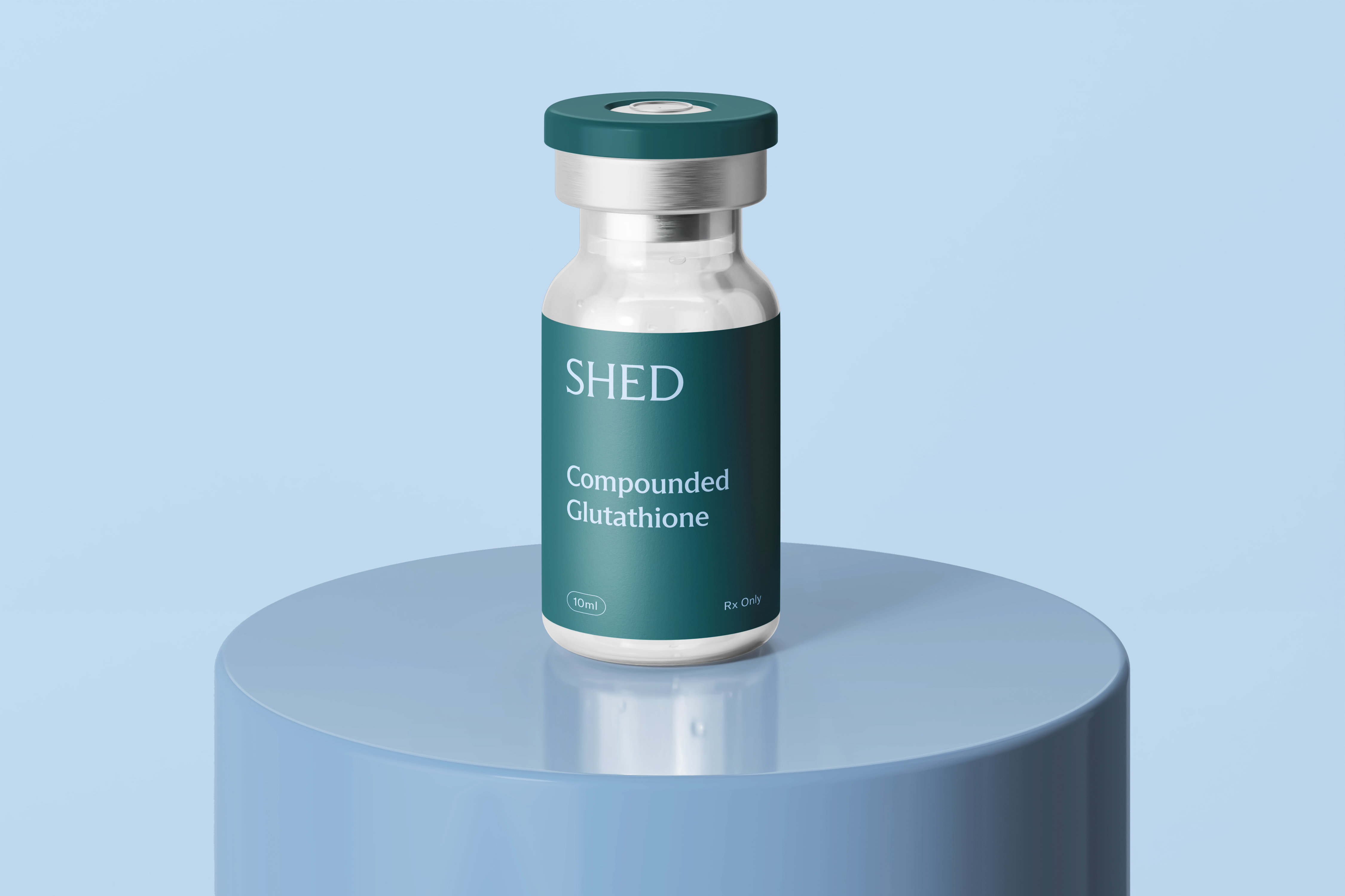 Vial of Compounded Glutathione on a blue table