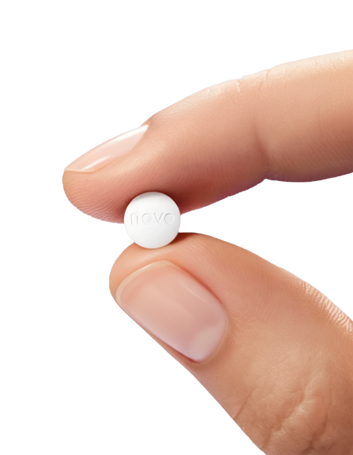 White pill between two fingers