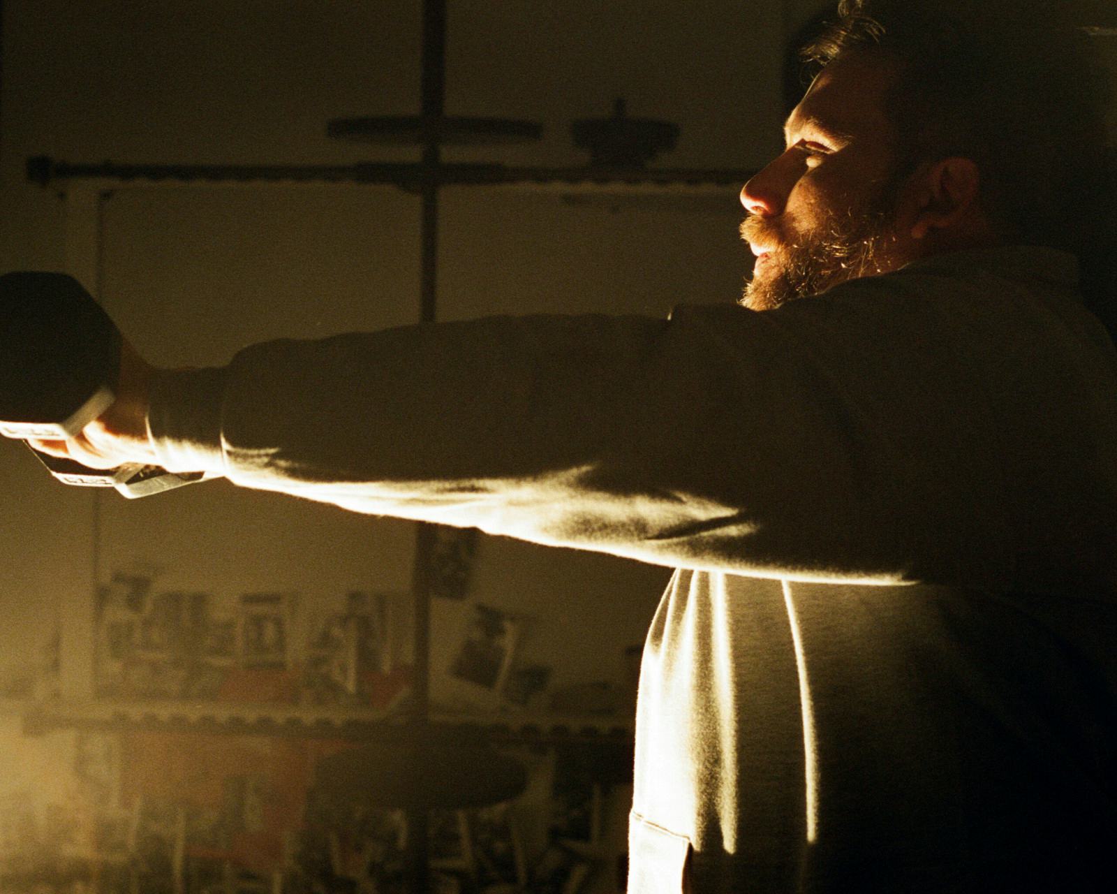 Main lifting weights at night