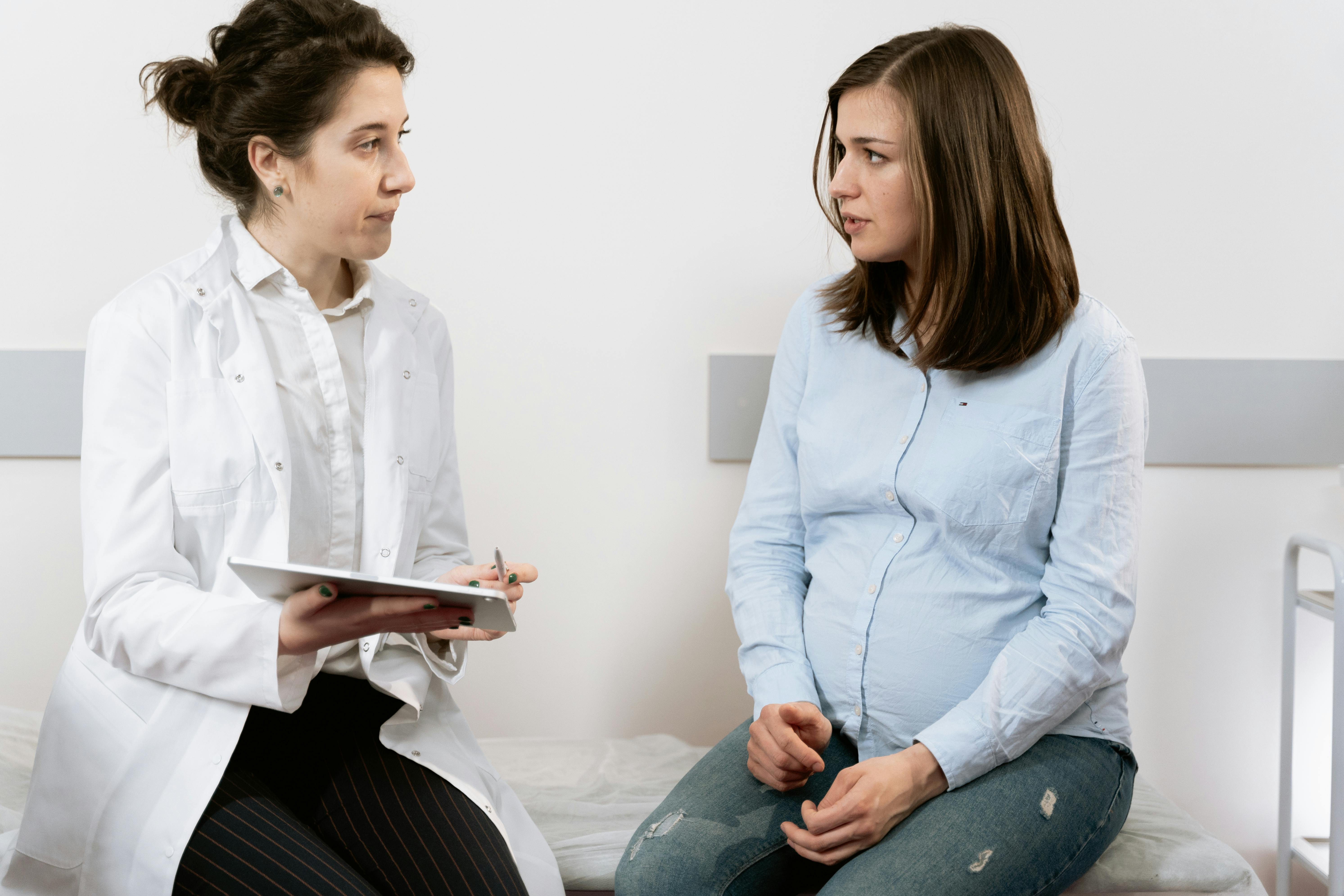 Doctor and pregnant woman at a doctor's appointment