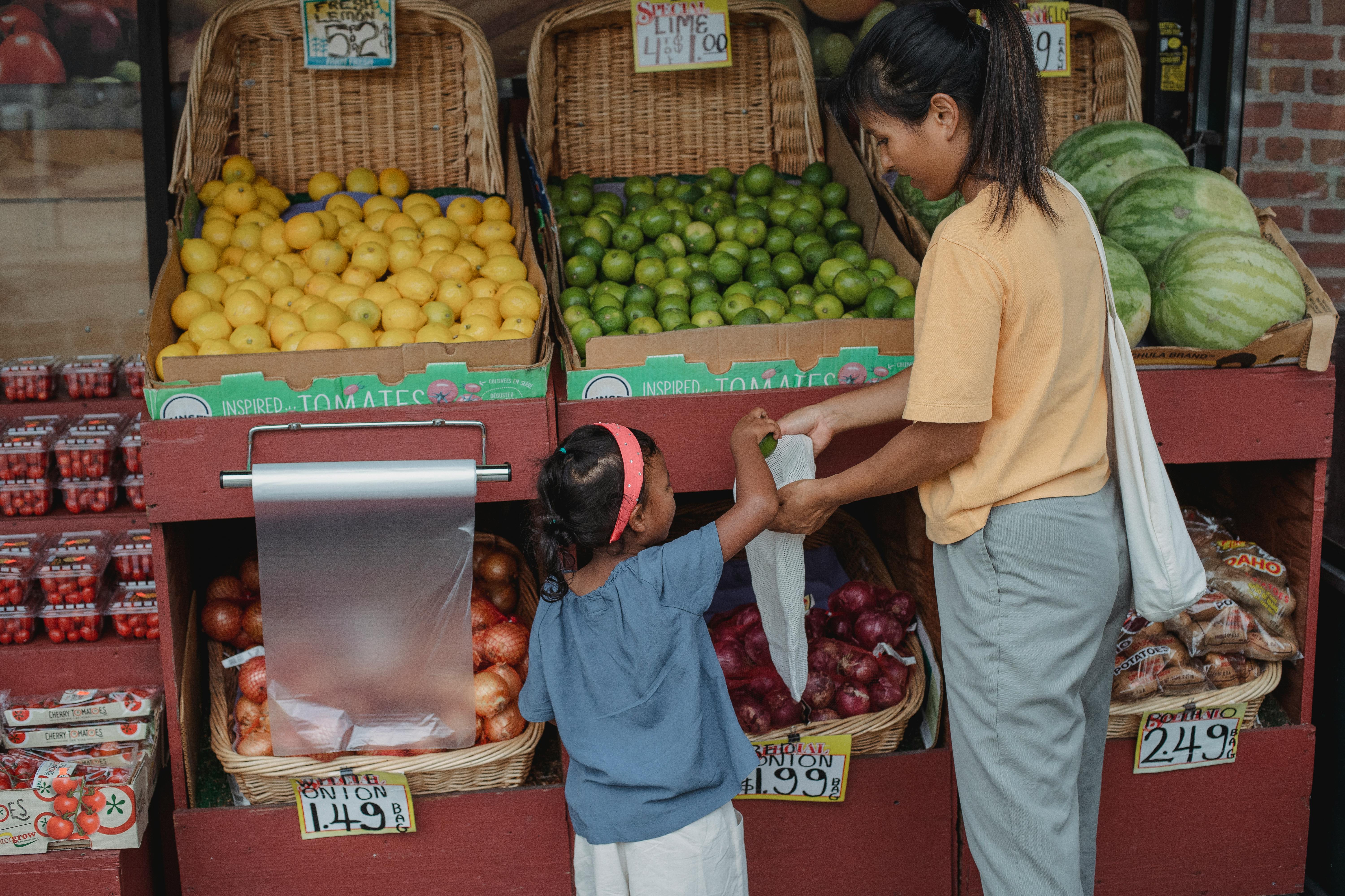 Woman and child shopping at farmers market