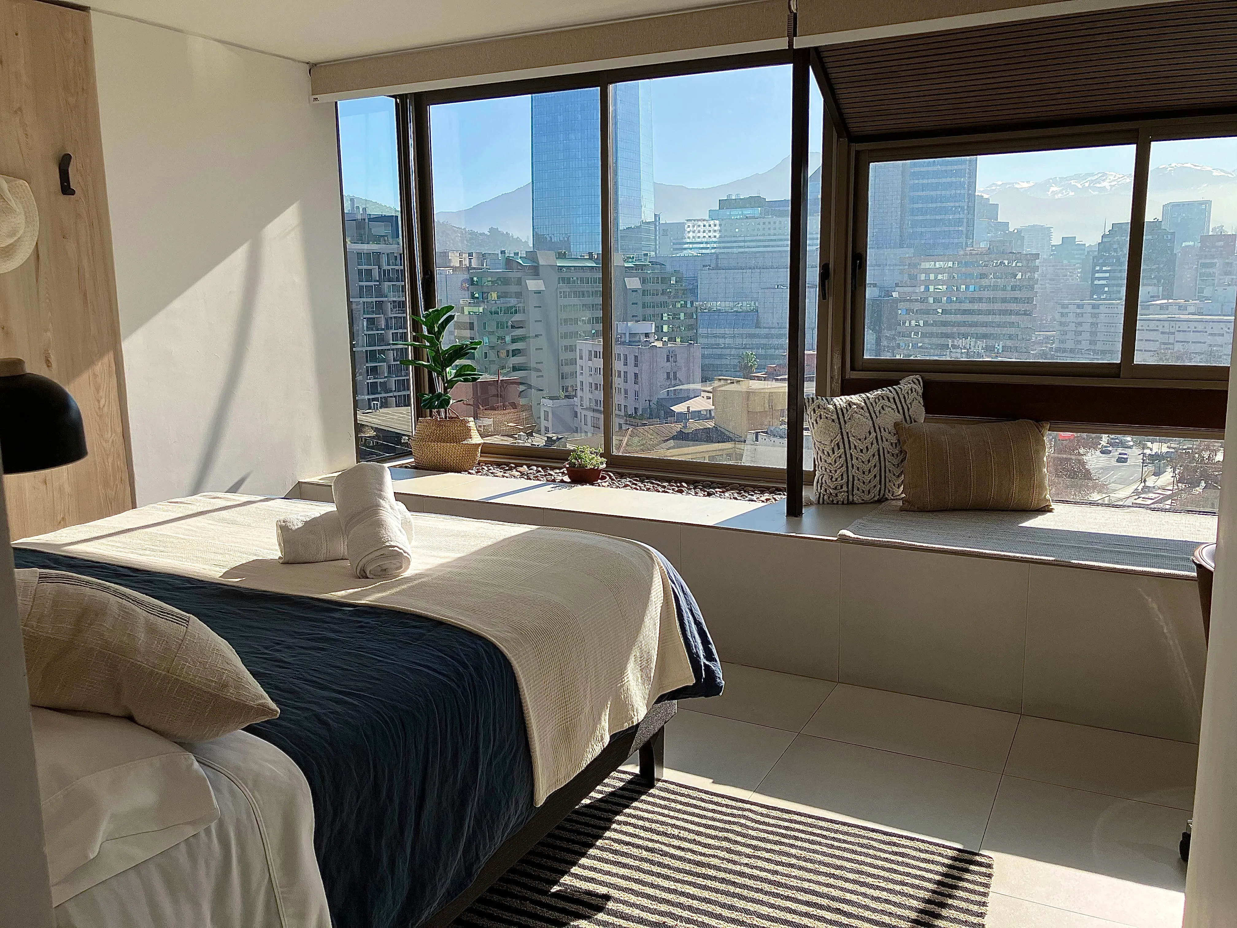 Spacious Suite152 master bedroom with panoramic Andes views