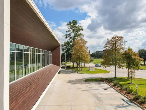 Commercial property with landscaped trees and planting beds