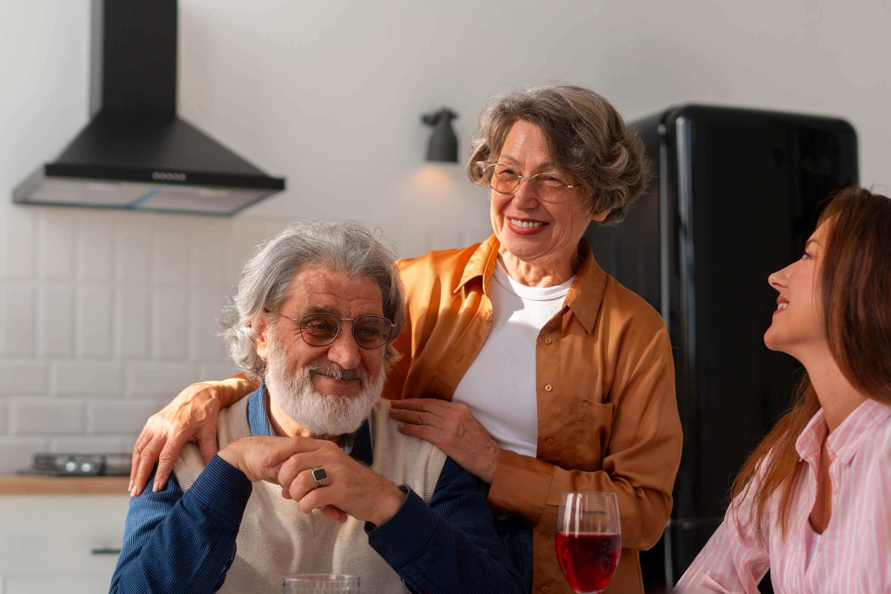 a family gathering with older father and mother and younger daughter