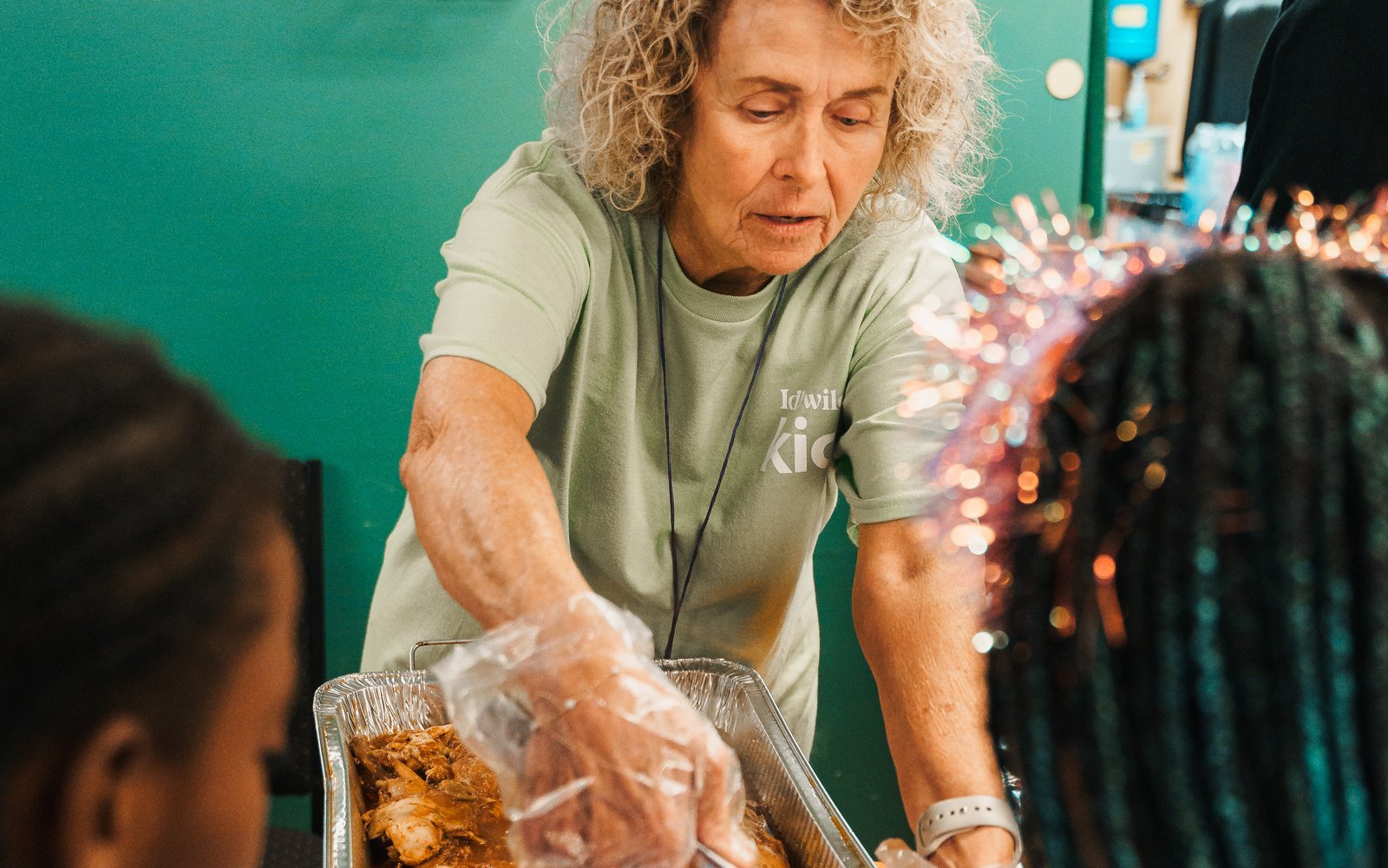 Volunteers serving hot meals at Hope Café — stylized illustration